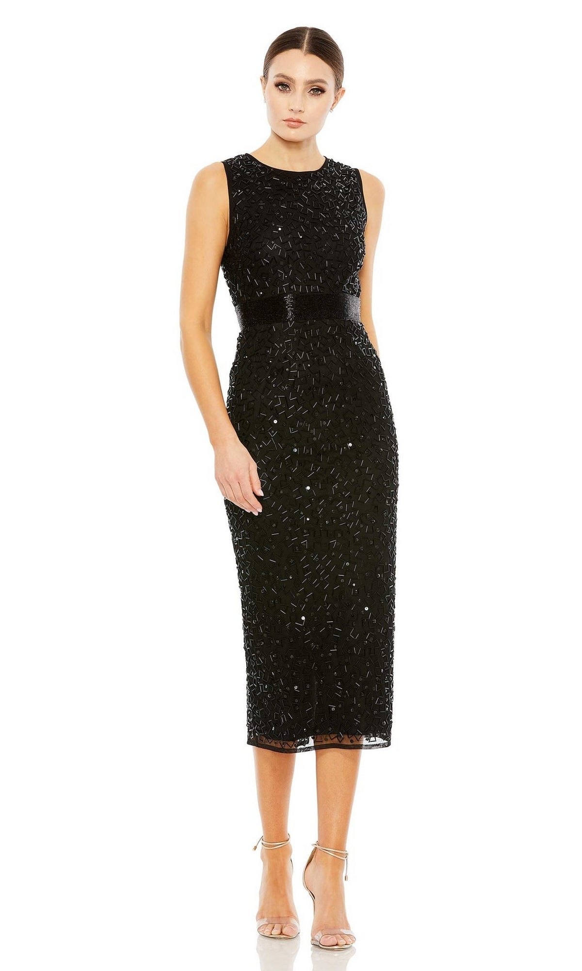 A woman wears the Beaded Midi Wedding-Guest Dress: Mac Duggal 93758—a sleeveless black sequined midi dress with a fitted waist and strappy high-heeled sandals—posing against a white background for an elegant look.